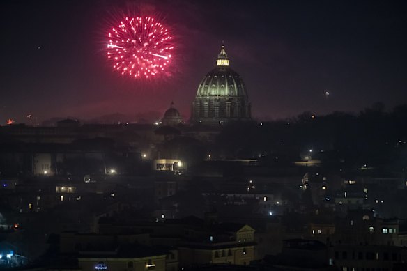Fireworks are seen over St. Peter's Basilica on New Year's Eve in Rome, Italy. 