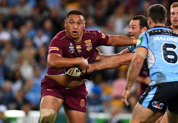 Josh Papalii of the Queensland Maroons pushes Boyd Cordner of the NSW Blues during State of Origin Game 3 on Wednesday. 