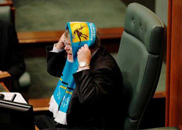 Almost every MP wore a scarf including the Speaker Harry Jenkins in his case in an unorthodox manner in support of Australia's bid for the 2022 FIFA World Cup