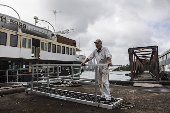 Engineer Graeme Curran alongside the South Steyne, one of Australia's most prized vessels. 