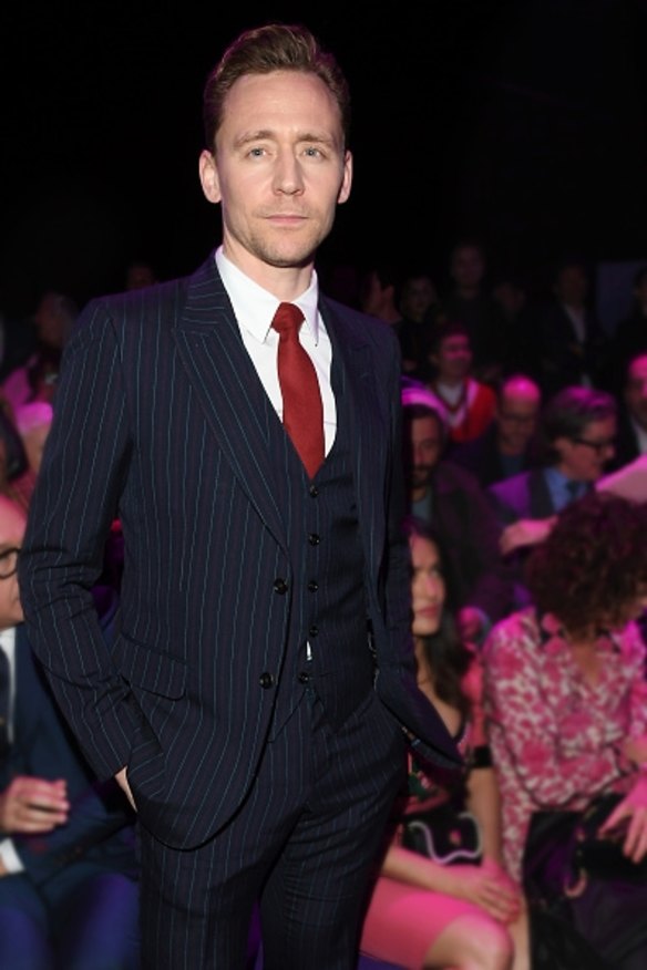 As the face of Gucci's cruise 2017 tailoring campaign, Tom Hiddleston looked dapper in a pinstripe suit and red tie at the brand's show.