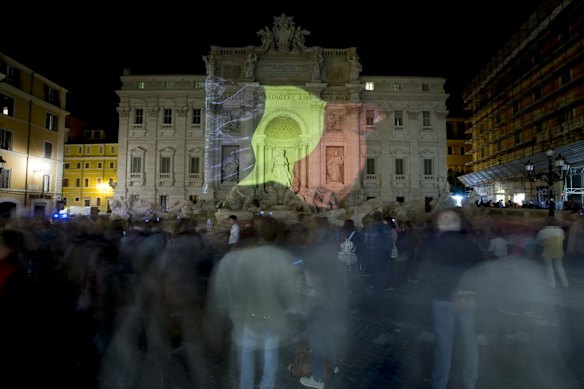 The Belgian flag is projected on Rome's historical Trevi Fountain to honour the victims of the deadly attacks at Brussels airport and subway.