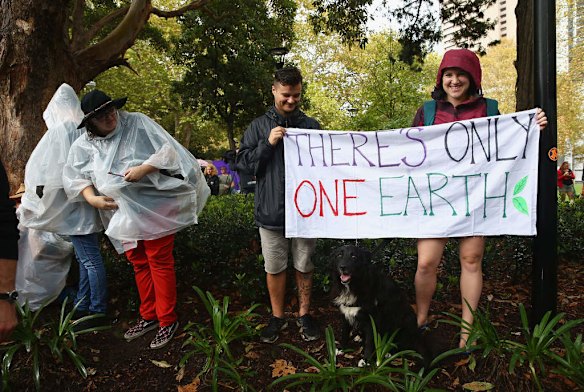 SYDNEY, AUSTRALIA - MARCH 16:  Protesters brave the wet and miserable conditions to demonstrate against the Abbott led Coalition Government on March 16, 2014 in Sydney, Australia. March In March is a nationwide grassroots protest organized to deliver a statement of no confidence in the current Australian Government.  (Photo by Don Arnold/Getty Images)