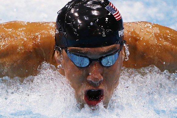 Michael Phelps of the US swims to win gold in the men's 200m individual medley final.