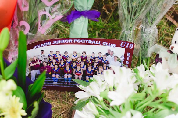 Flowers and cards left in memory of Luke Batty at Tyabb oval.