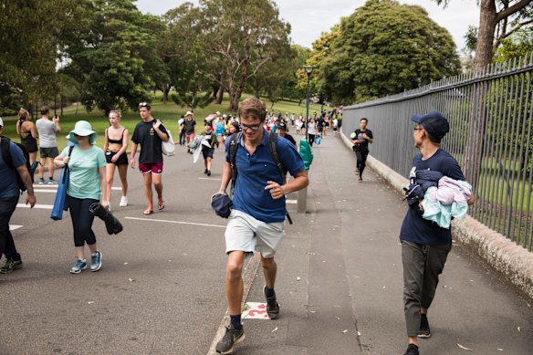 People run to secure a spot at Mrs Macquaries Chair to see the fireworks on New Years Eve.