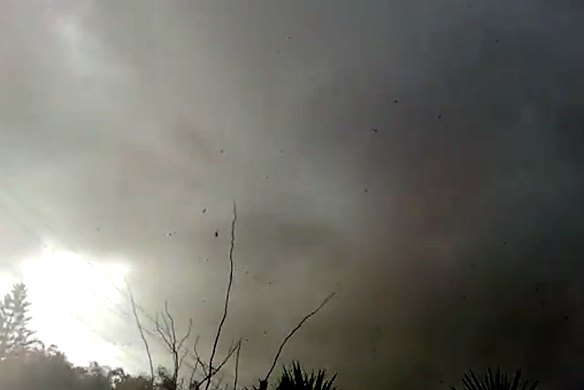 A witness captures debris shooting up into the air on his phone. Photo: YouTube