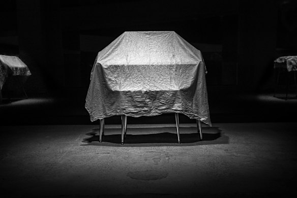 Keyboards which are part of the "Electric Keys" Exhibition which have been covered and protected from dust and sunlight in the Powerhouse Museum, Ultimo.

