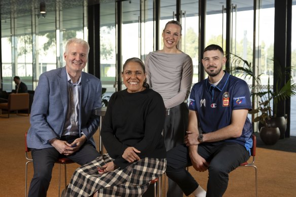 Olympic stars: The iconic Cathy Freeman is surrounded by legendary basketball Andrew Gaze (left), Opals captain Tess Madgen and Boomers star Chris Goulding on Friday.