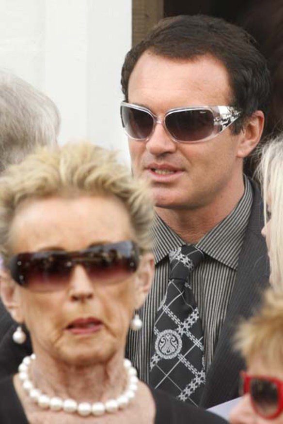 Lady Sonia McMahon and her son Julian McMahon at a funeral in 2009.