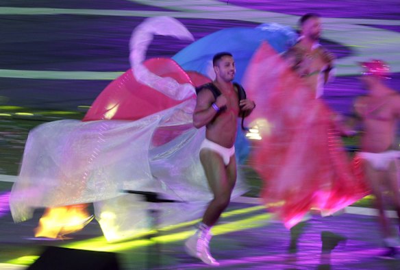 Participants march in the Gay and Lesbian Mardi Gras parade.