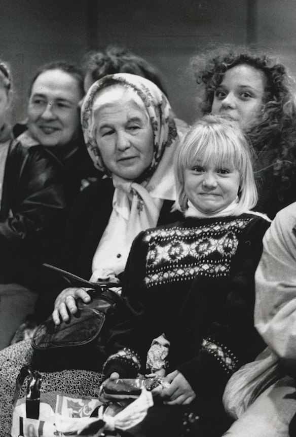  A foreign farewell: Maria Boyko, 8, shares a last few minutes at Tullamarine Airport with her Australian host "babushka", Zinaip Samourukoff, before flying hime with 39 other Chernobyl children who had been stranded in Melbourne.  Photo: Craig Abraham


