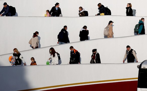 Ukrainians seeking asylum in the United States at El Chaparral port of entry in Tijuana, Mexico. US authorities are giving Ukrainian refugees permission to remain in the country for one year on humanitarian grounds.