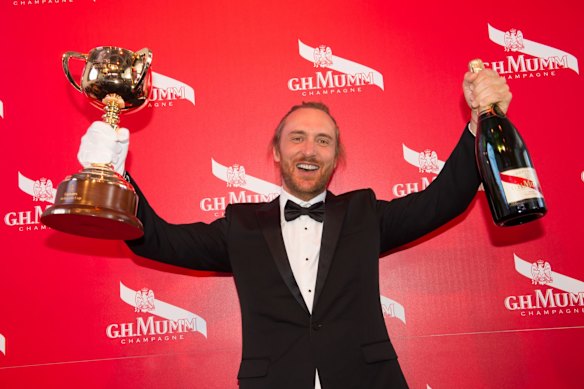 DJ David Guetta living it up in the Mumm marquee at the Melbourne Cup.