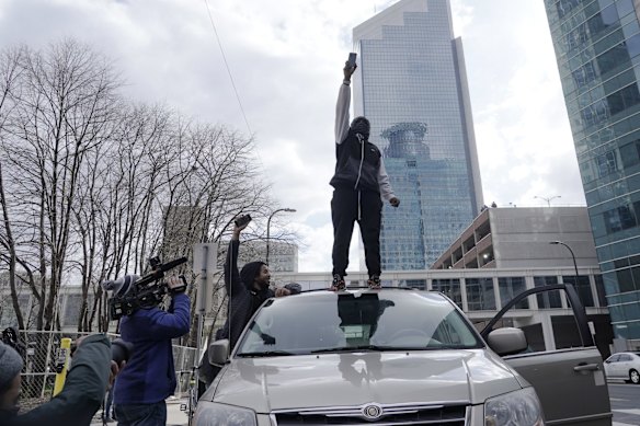People cheer after a guilty verdict was announced at the trial of former Minneapolis police Officer Derek Chauvin.