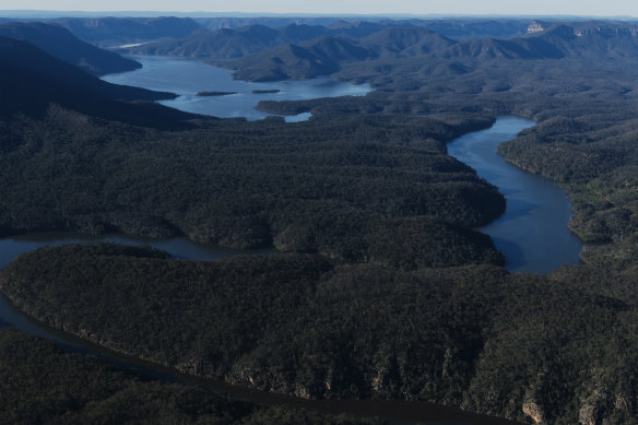 Lake Burragorang from above. The lake sits behind Warragamba Dam, and would potentially fill as much as 17 metres higher if the government proceeds with plans to raise the dam's wall height. A survey found 334 Indigenous sites in the new flood zone during a study that examined only 27 per cent of the at-risk area.