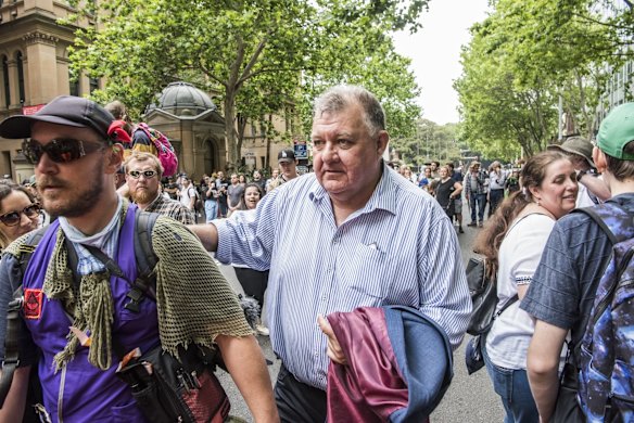 Craig Kelly arrives to address the crowd of the World Wide Rally for Freedom March, in Sydney, against vaccine mandates and various other COVID related health orders.