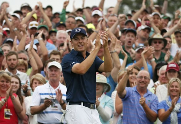 Jordan Spieth celebrates on the 18th green after winning the 79th Masters.
