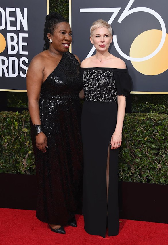 #Metoo founder Tarana Burke, left, and Michelle Williams arrive at the 75th annual Golden Globe Awards.