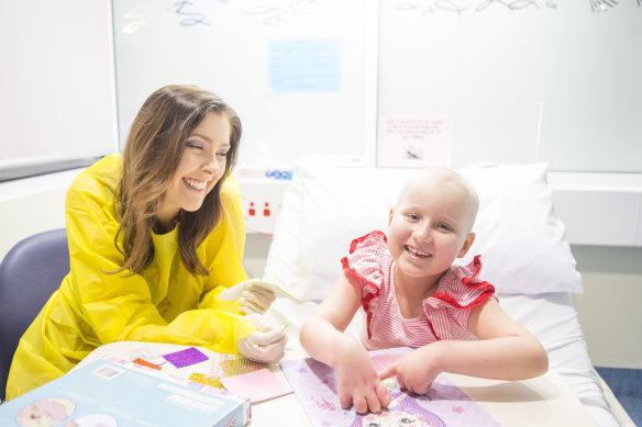 Kylie Estreich, child life therapist at Sydney Children's Hospital, with Ruby Atkinson.