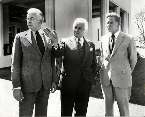 The Prime Minister Gough Whitlam, the Governor General Sir John Kerr & the new Minister for Minerals and Energy Senator Wriedt in the grounds of Government House after the Senator wa sworn in. 14 October 1975. Fairfax Photo Library