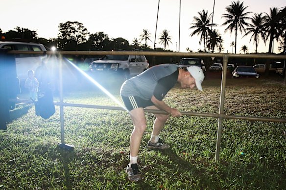 Prime Minister Tony Abbott jogs to Bamaga oval to doing physical training with members of the community, during his visit to Cape York, on Friday 28 August 2015. 