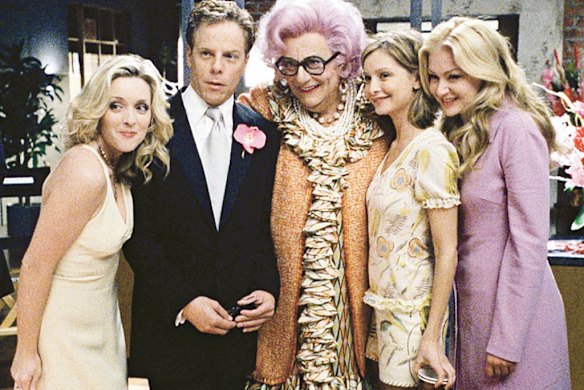 Barry Humphries as Dame Edna Everidge with Calista Flockhart and crew in Ally McBeal.