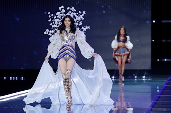 Model Ming Xi wears a creation during the Victoria's Secret fashion show.