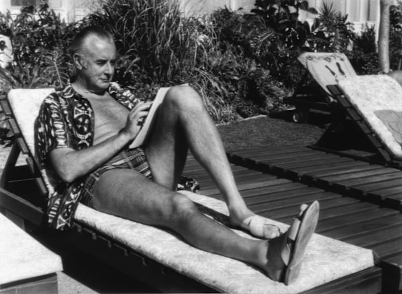 Here's one of a pollie in bathers you may not have expected: Gough Whitlam works on a policy speech at Surfers Paradise in 1972.