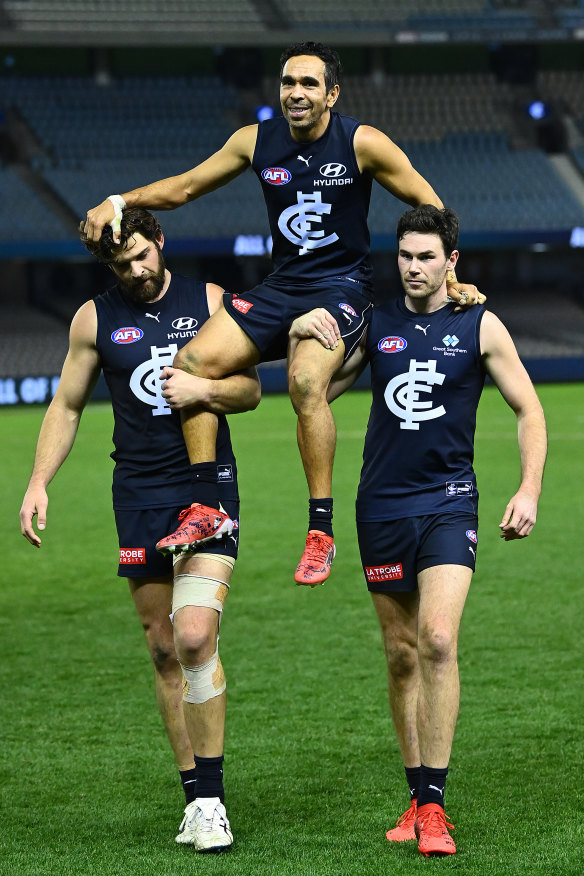 Eddie Betts is chaired off the field in his final AFL game last year.