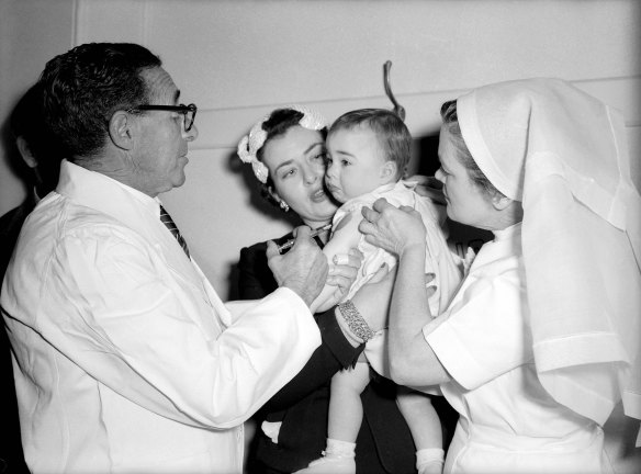Children receiving salk vaccine. Taken on 5 July 1956.