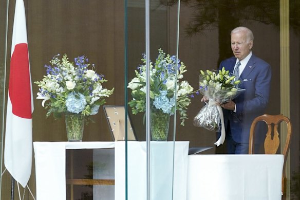 US President Joe Biden arrives to sign a condolence book at the Japanese ambassador's residence in Washington.