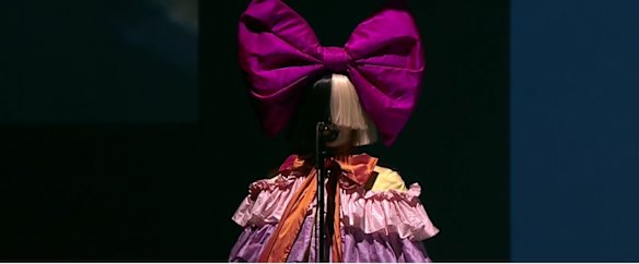 Sia performs at the Apple iPhone launch
