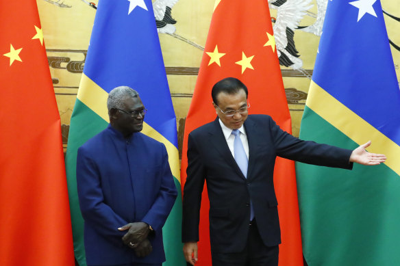 Thriving relationship. Solomon Islands Prime Minister Manasseh Sogavare and Chinese Premier Li Keqiang during a diplomatic visit to Beijing in 2019.