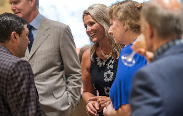 Kirralie Smith speaks with attendees.