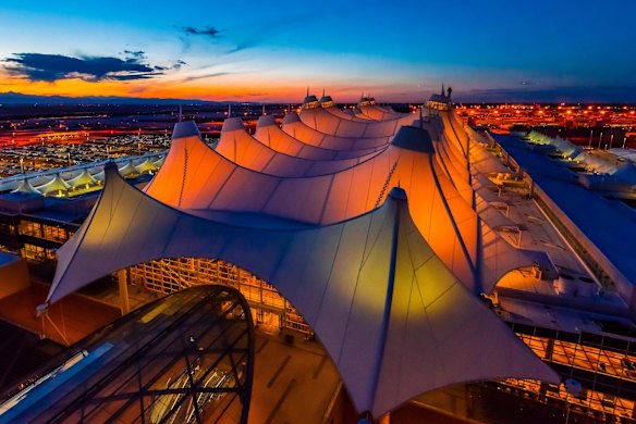 JEPPESEN TERMINAL, DENVER: Denver airport's Jeppesen Terminal features pitched roofs that recall the peaks of the surrounding Rocky Mountains, or perhaps early settler wagons or native tepees – and they certainly prove airports don't have to be boring. The tent-like roofs are made from wafer-thin fibreglass coated with Teflon, thin enough to let in light. The terminal is often cited as having one of the best architectural designs of any American building.