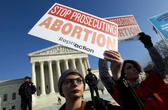 Abortion rights activists protest at the US Supreme Court during the March for Life in Washington. 