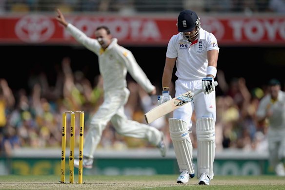 Nathan Lyon celebrates the wicket of Matt Prior as the batsman leaves the field.