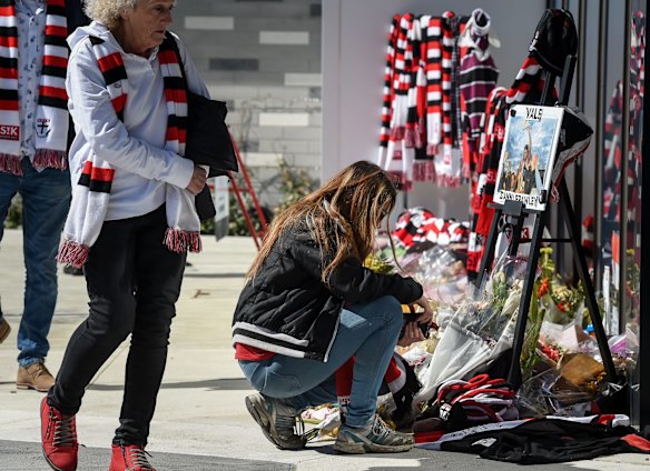Fans leave tributes to Danny in front of the clubrooms.