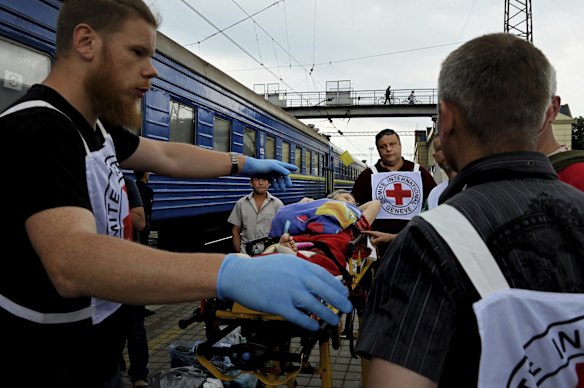 Wounded and sick Ukrainians are carried on to a medical evacuation train in the city of Porovsk. Medecins Sans Frontieres (MSF) and Ukrainian Red Cross cares for patients that need to be medically evacuated from the war-affected areas of eastern Ukraine. 