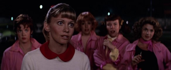 Olivia Newton John with the Pink Ladies of Grease.