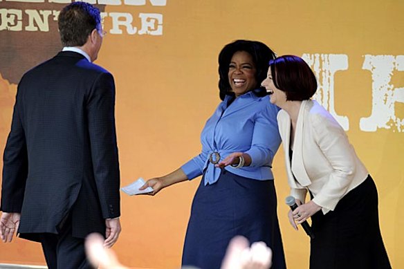 Oprah on stage with Prime Minister Julia Gillard and Victorian Premier Ted Baillieu.
