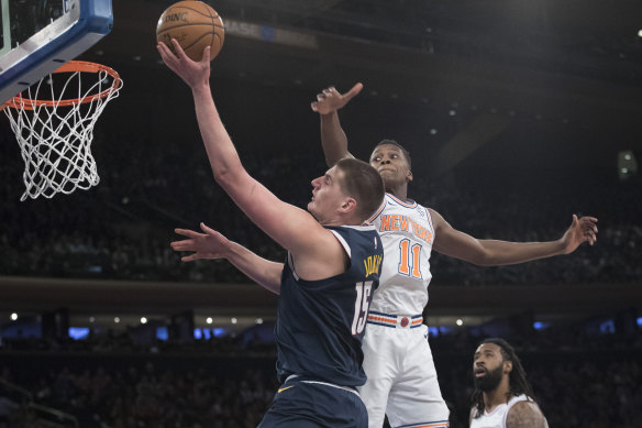 Imposing: Denver's Nikola Jokic takes on the New York Knicks.
