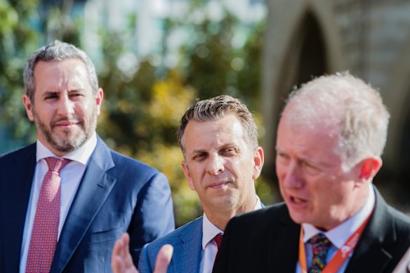 Andrew Constance (centre) Minister for Transport and infrastructure and Howard Collins speaking during a press conference. The Sydney Yard Access bridge is being constructed to facilitate the work on Central Station. 