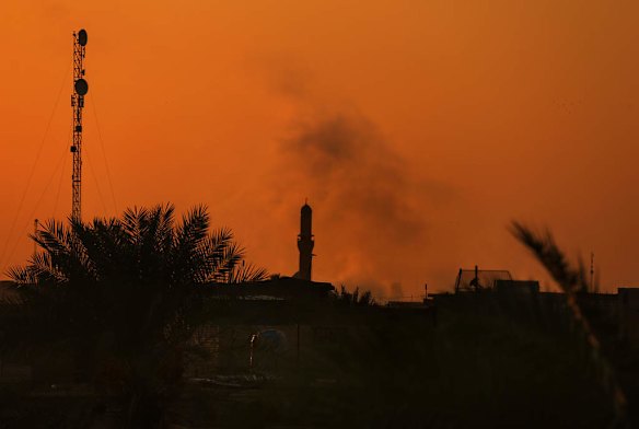 Smoke from indirect fire caused by mortar rounds in West Baghdad, in the vicinity of the Baghdad International Airport. Baghdad, Iraq.