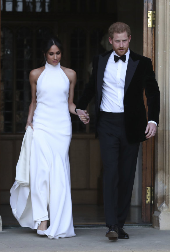 The Duke and Duchess of Sussex, in new outfits, leave their lunch reception . 