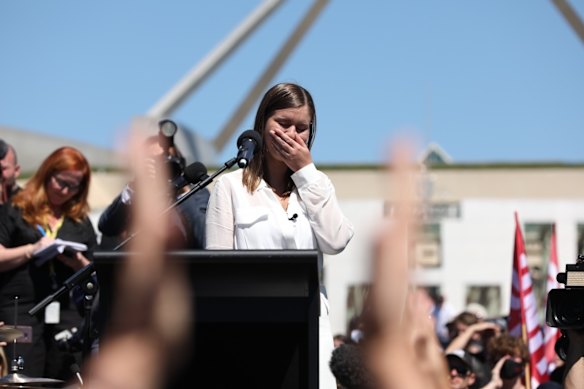 In Canberra, Brittany Higgins speaks at the March 4 Justice protest to rally against abuse and discrimination of women in Australia at Parliament House.