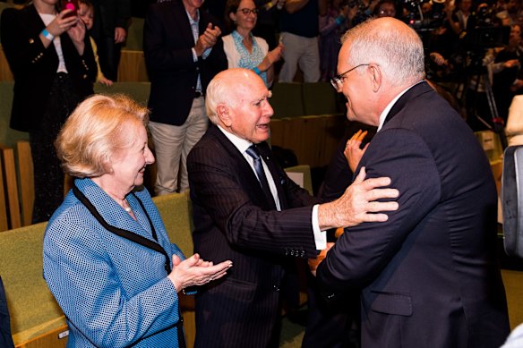 Australian Prime Minister Scott Morrison greets former Prime Minister John Howard and his wife Janette at The Brisbane Convention and Exhibition Centre for the official Coalition campaign launch. 