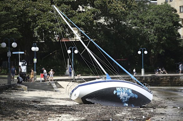 Yachts and boats were turned over along Little Manly Beach.