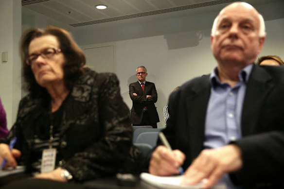 Communications Minister Malcolm Turnbull listens as Foreign Affairs Minister Julie Bishop comments on the Peter Greste sentence during a press conference at Parliament House in Canberra on on Monday 23 June 2014.
